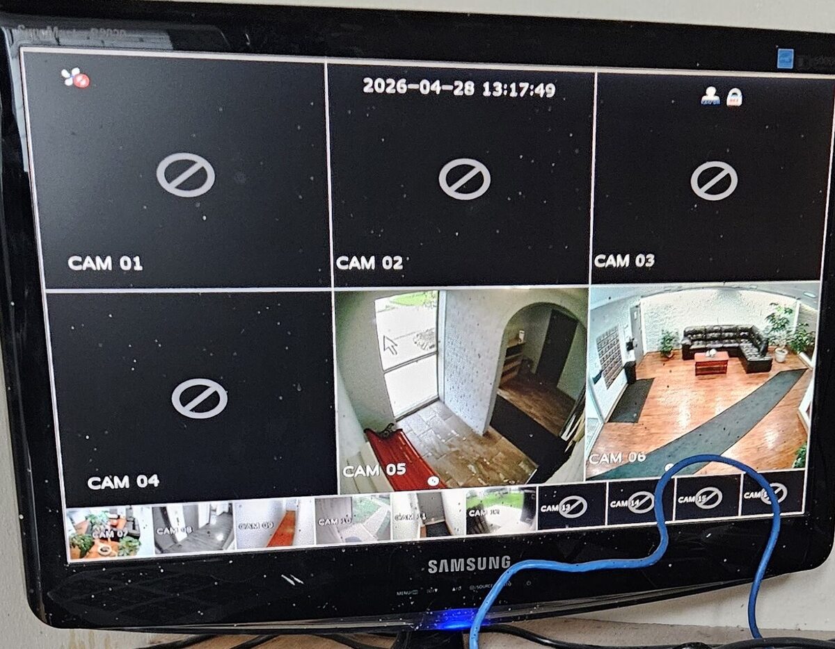 Outdated DVR system at a London, Ontario apartment building showing several camera channels offline before the UniFi Protect upgrade.
