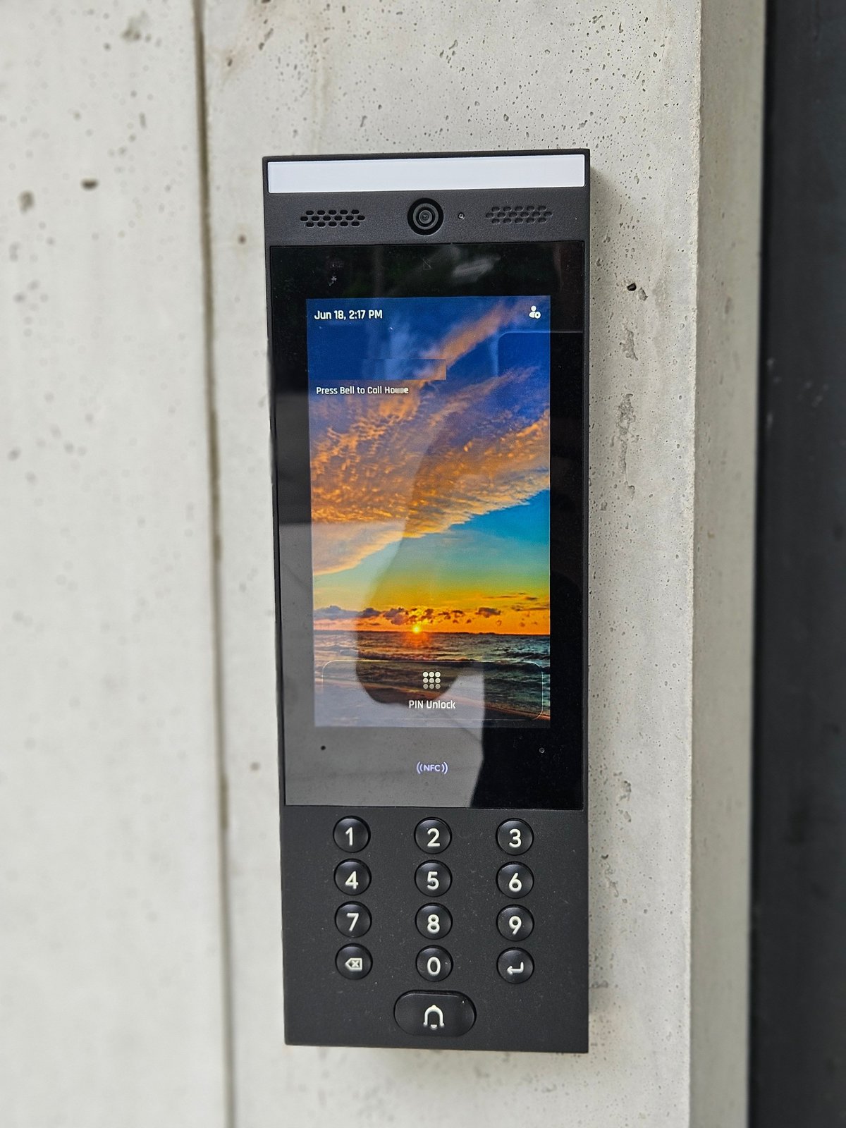 UniFi G3 Intercom touchscreen showing the call-the-house, PIN unlock and NFC tap options